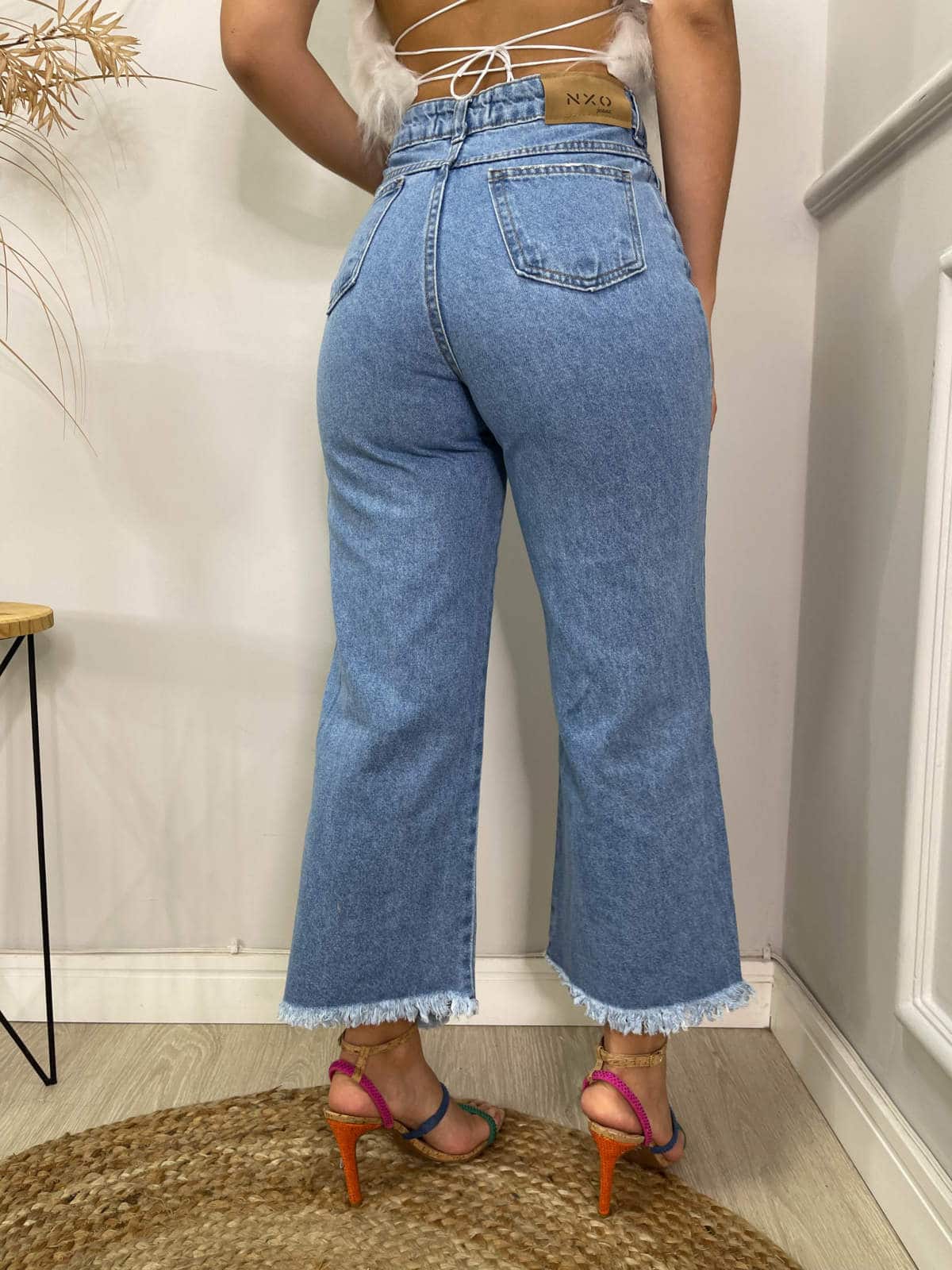 Calça flare jeans claro barra desfiada nexo – Lavinny Store